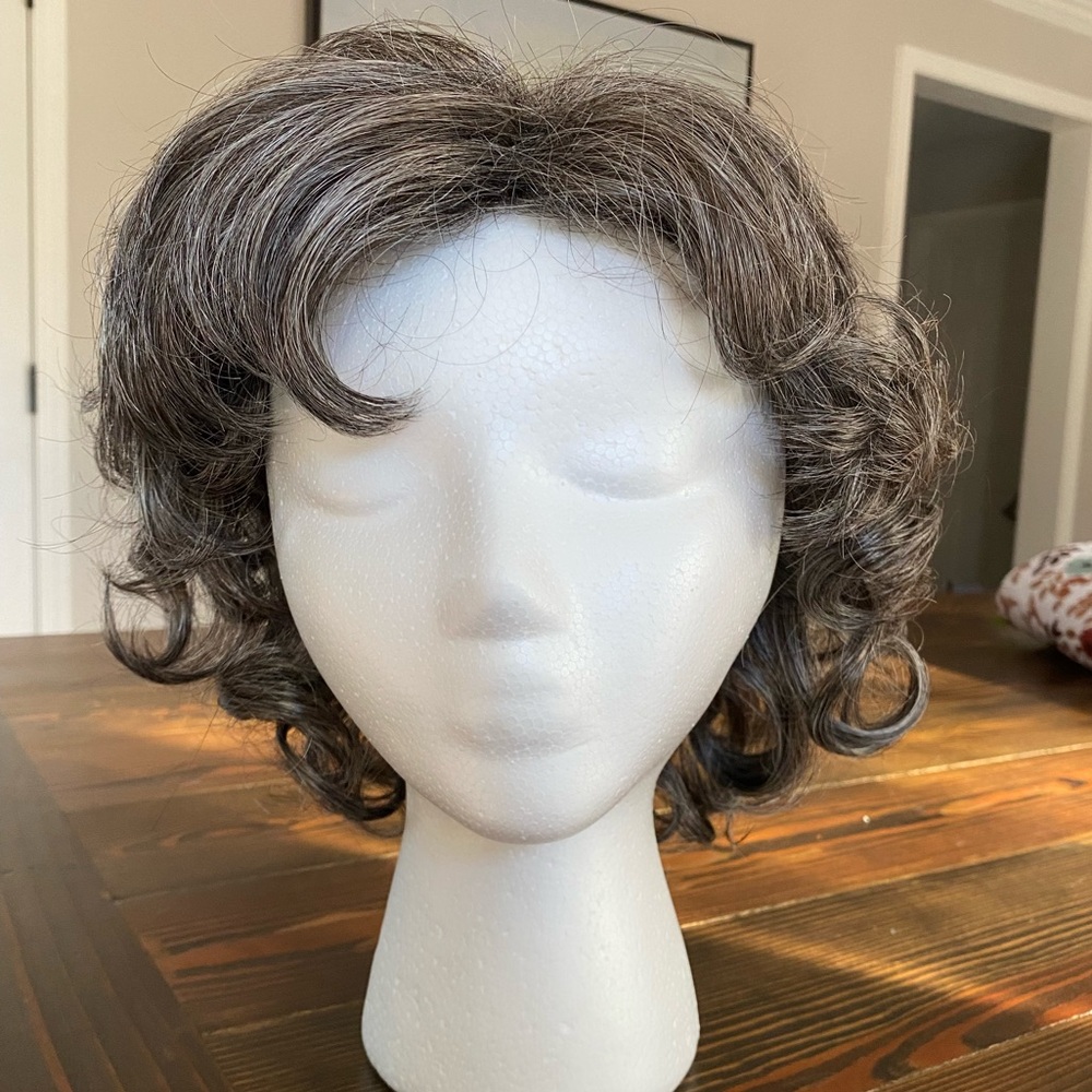 Paula Young salt and pepper wig gently worn.